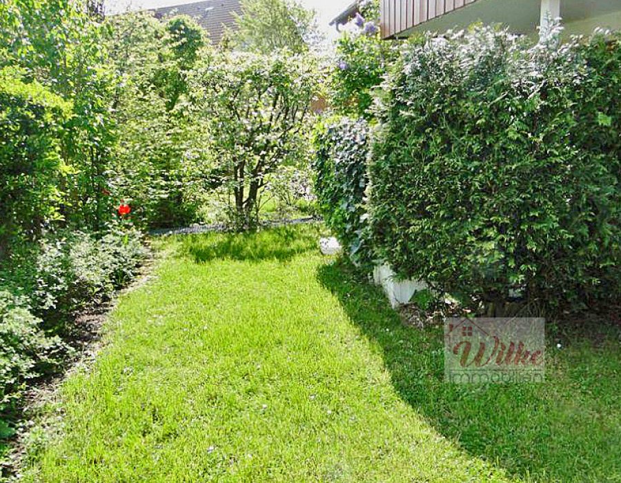 Helle 2-Zimmer-Wohnung mit Terrasse und Garten Bild 2